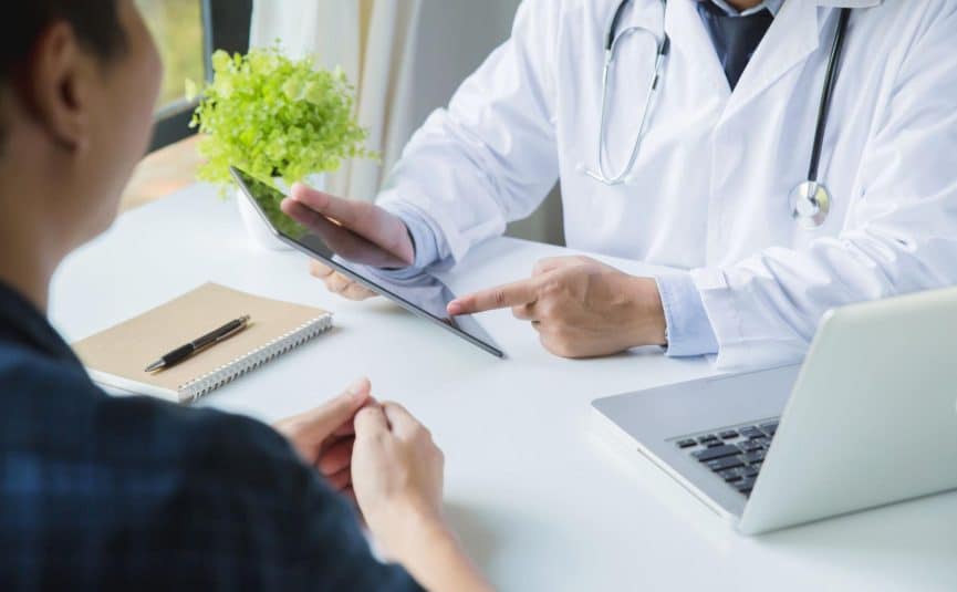 a doctor in a consultation with a patient